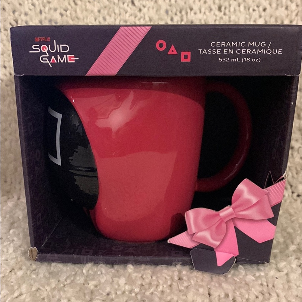 Squid Game character mug, holds 18 ounces.